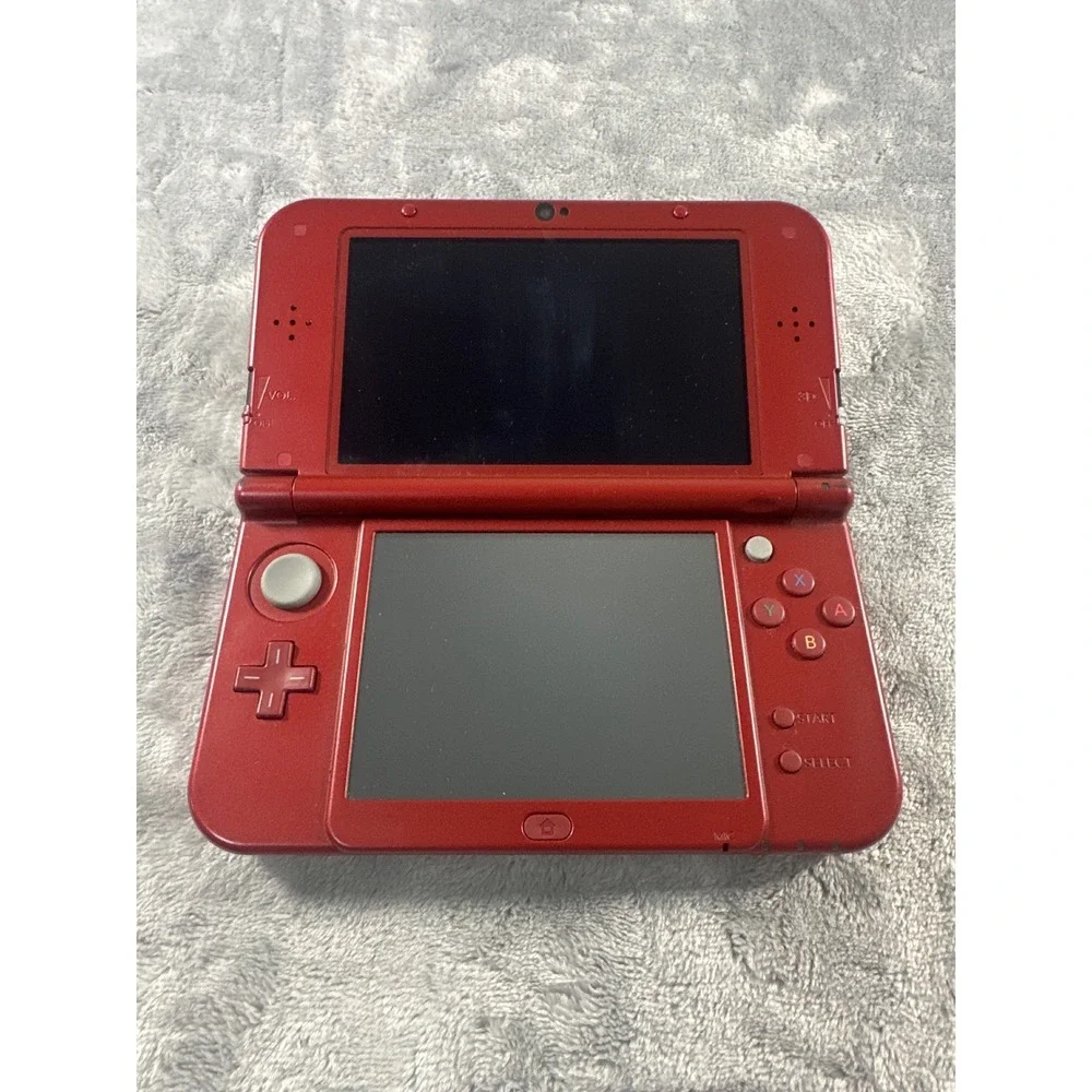 Nintendo New 3DS XL Metallic Red. Stylus and charger NOT included